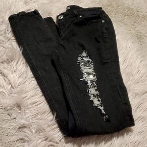 Sexy ripped skinny jeans with silver sequins  Size 3